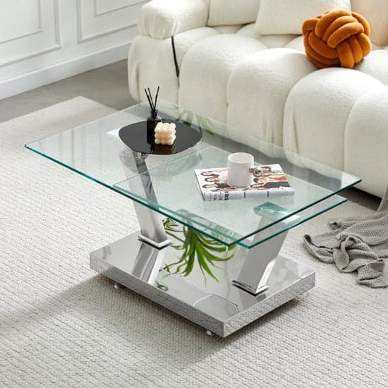 Magna Wings Swivel Clear Glass Coffee Table With Steel Base